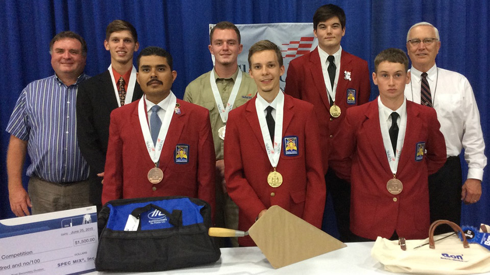 And the winners are... (back row L to R) Silver Medal Post-secondary/College Cody Palmer, The Williamson Free School of Mechanical Trades in Media, PA — Silver Medal Secondary Tyler Hack, Anthis Career Center in Fort Wayne, IN — Gold Medal Secondary Luke Dutton, West Rowan High School in Mount Ulla, NC... (front row L to R) Bronze Medal Post-secondary/College Jose Hernandez, Arizona Mason Contractors Association in Phoenix, AZ — Gold Medal Post-secondary/College Alex Ossowski, Central Cabarrus High School in Concord, NC — Bronze Medal Secondary Eric Kurtz, Penta Career Center in Perrysburg, OH. Flanking the winners are SkillsUSA Masonry Technical Committee Members (extreme left) Bill Kjorlien, Masonry Technical Services Manager Argos USA; and (extreme right) Bryan Light, Technical Services Manager Brick Industry Association SE-Region and Chair of the Masonry Technical Committee.